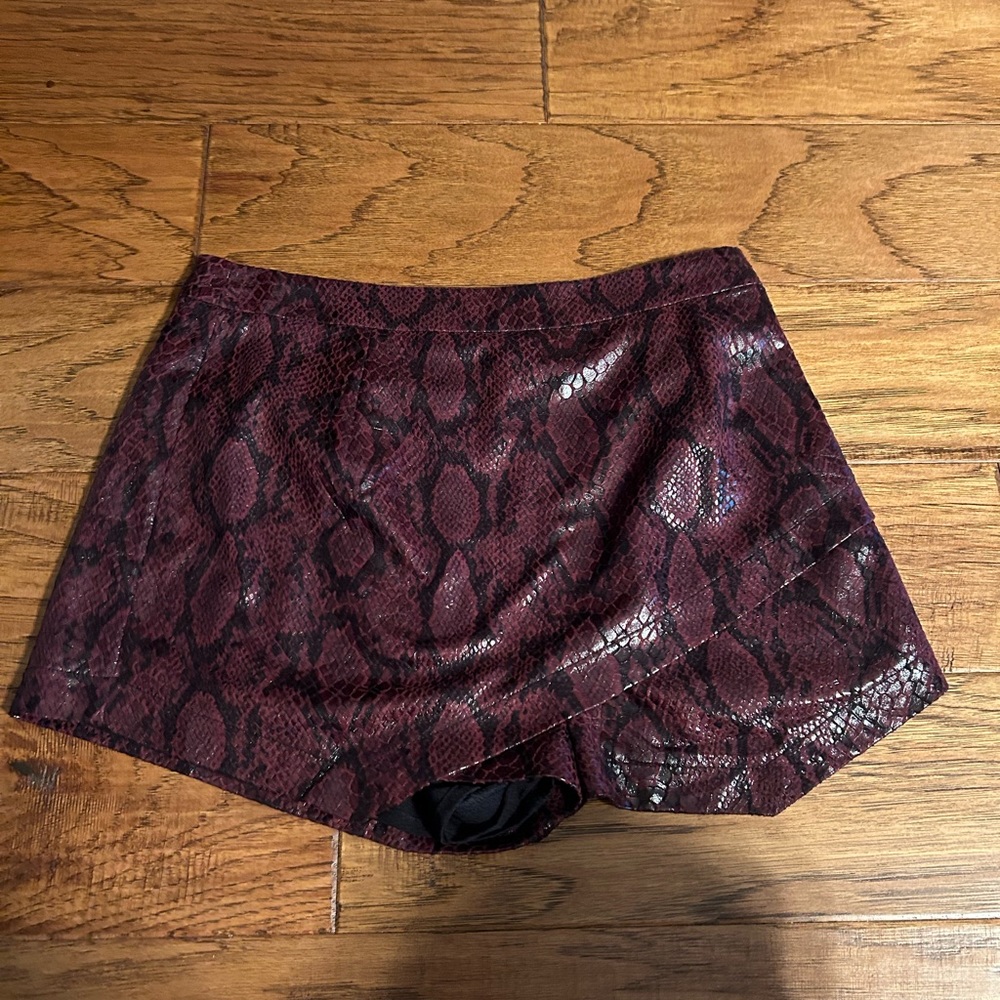 These Three Boutique Maroon Snakeskin Overlay Shorts